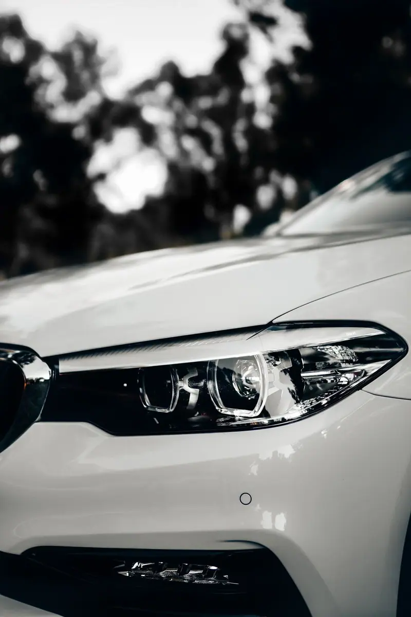 Clear LED headlight on a white car