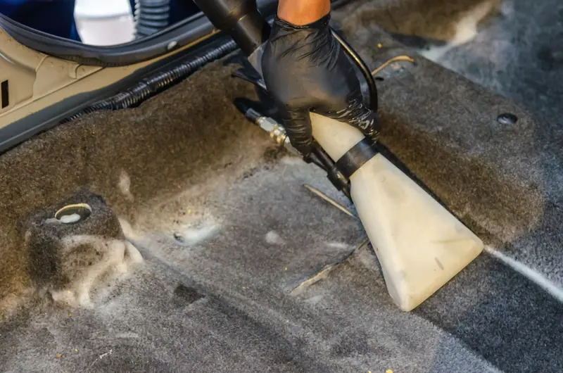 Upholstery extractor tool cleaning car carpet