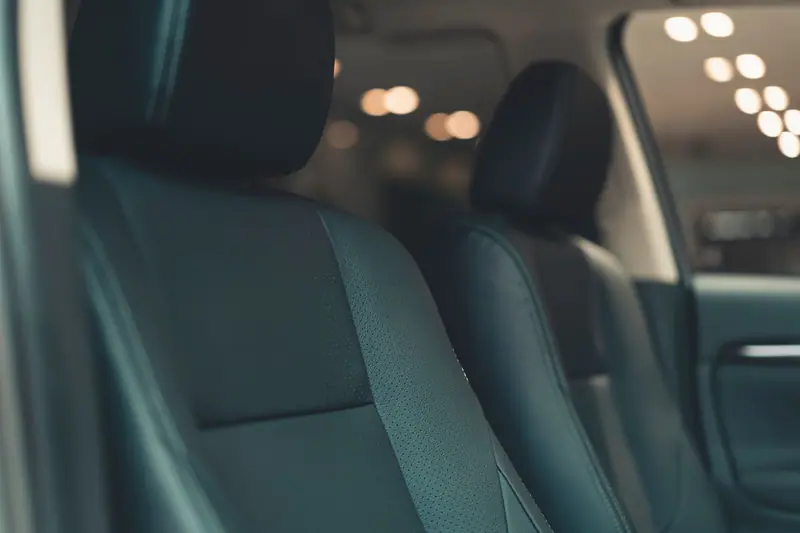 Black leather rear seats in a clean car interior